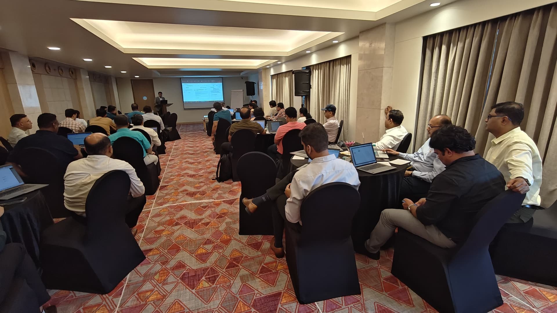Business leaders taking part in an applied AI workshop