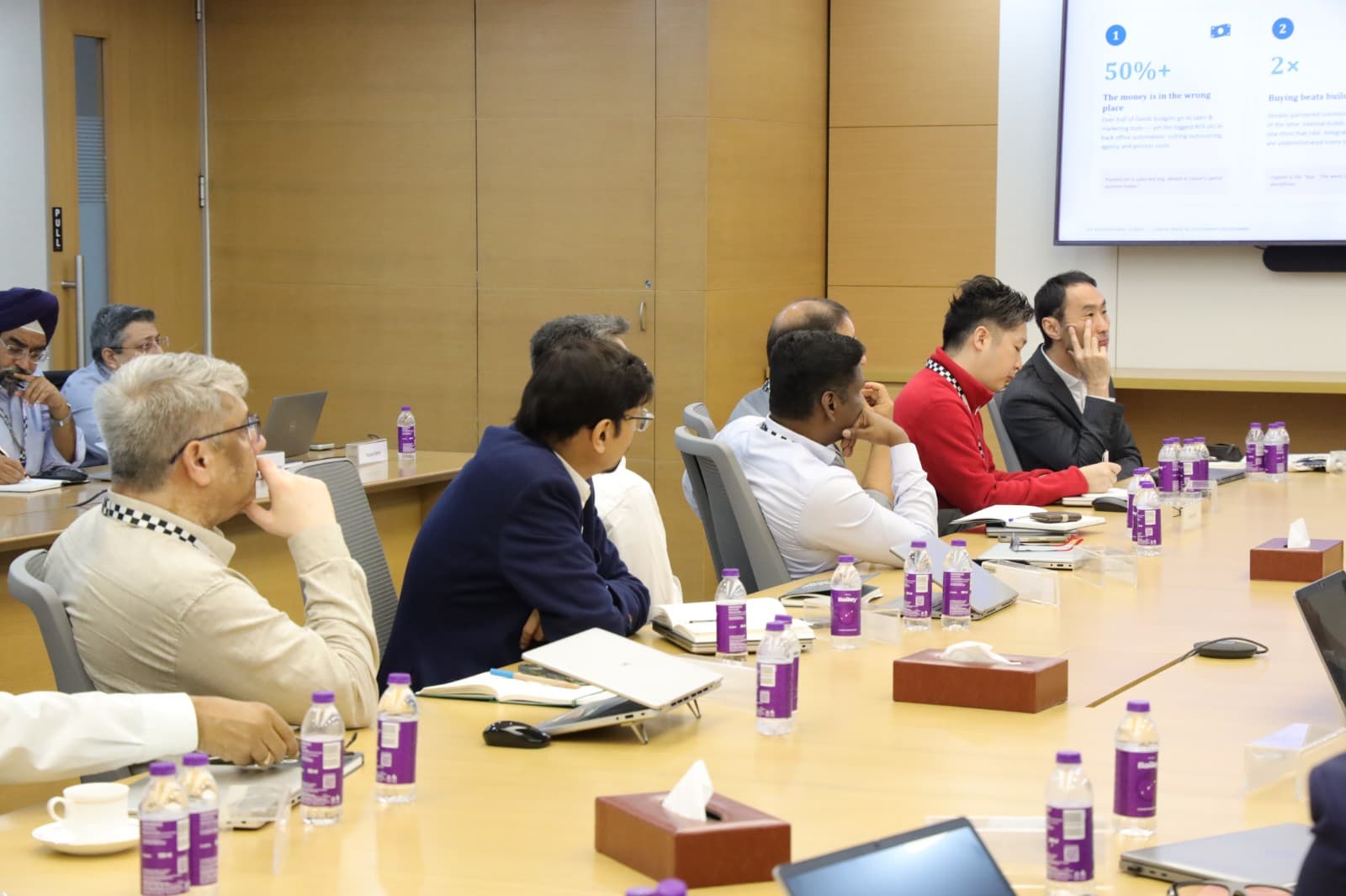CXOs participating in an enterprise AI leadership session